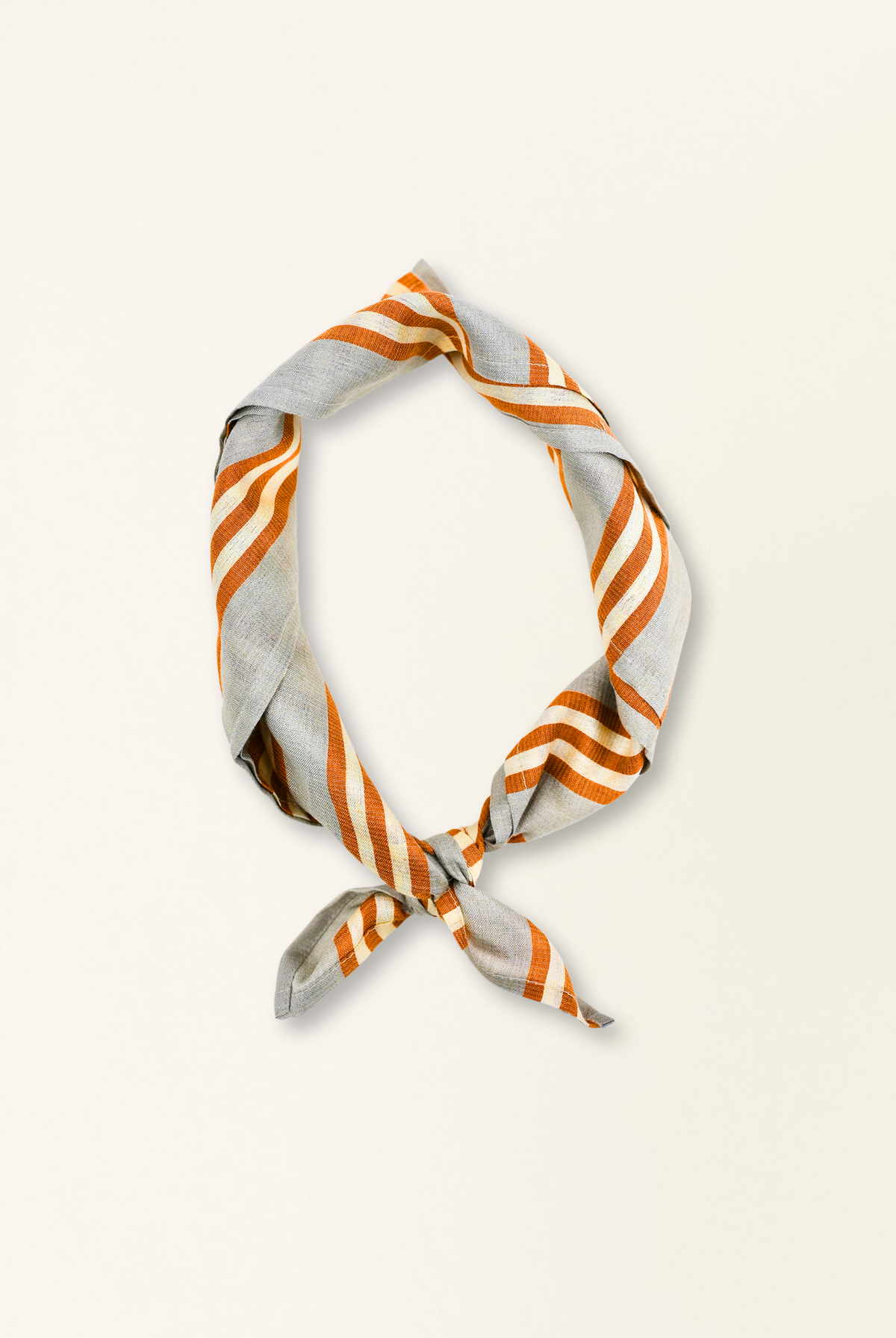 Striped scarf with orange and gray pattern on a white background