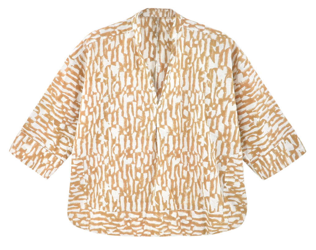 Girl wearing MIRTH women's v neck three quarter sleeve camden top in driftwood brown print cotton