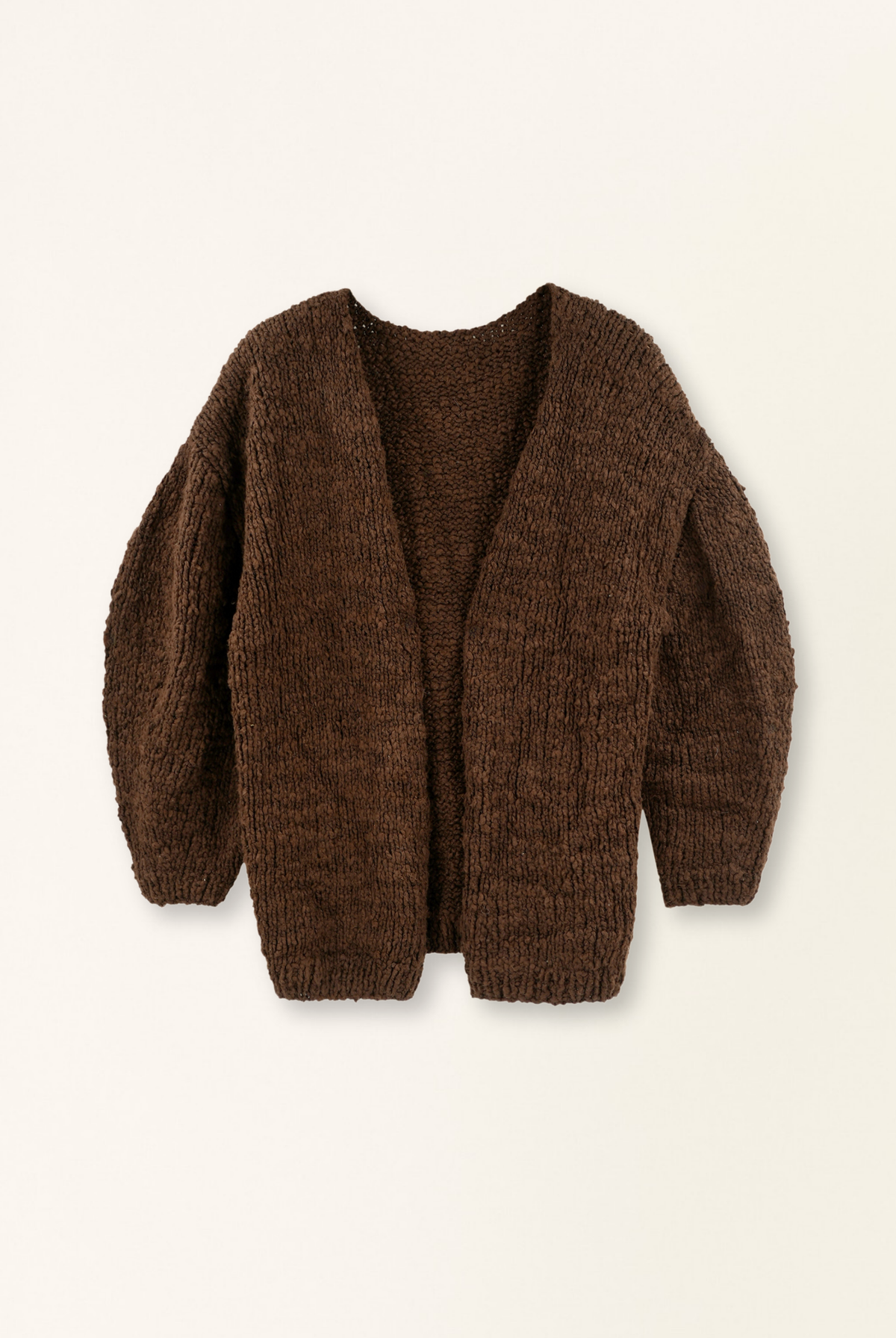 Brown knitted cardigan on a beige background