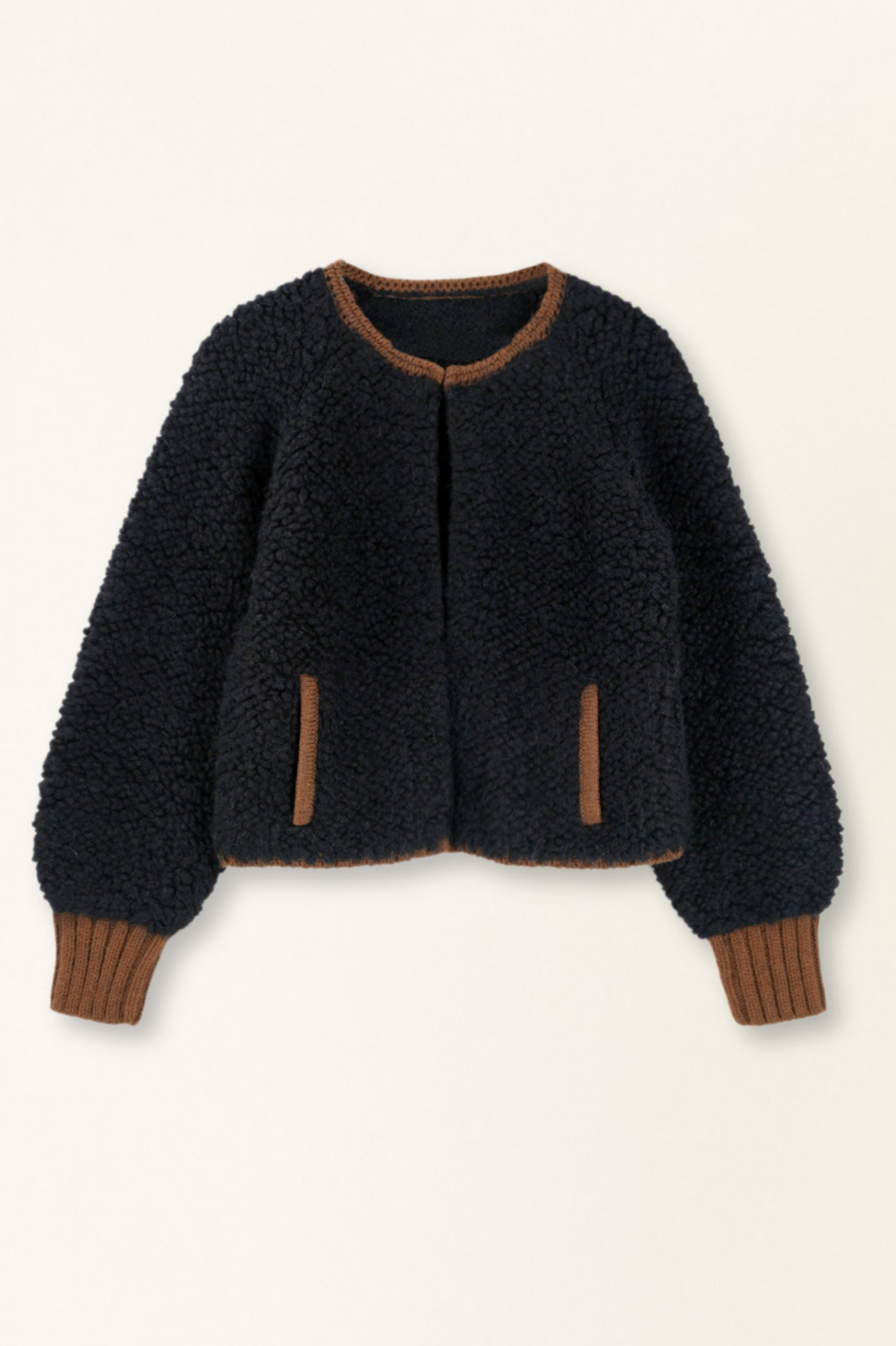 Dark blue textured jacket with brown trim on a beige background