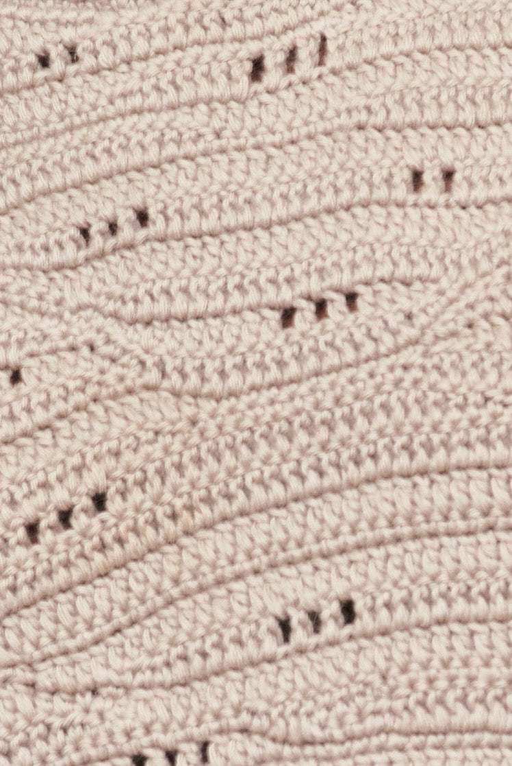 Girl wearing MIRTH women's hand crocheted marin sweater vest in koala grey alpaca wool