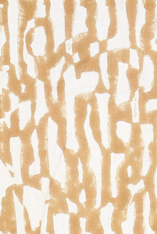 Girl wearing MIRTH women's v neck three quarter sleeve camden top in driftwood brown print cotton