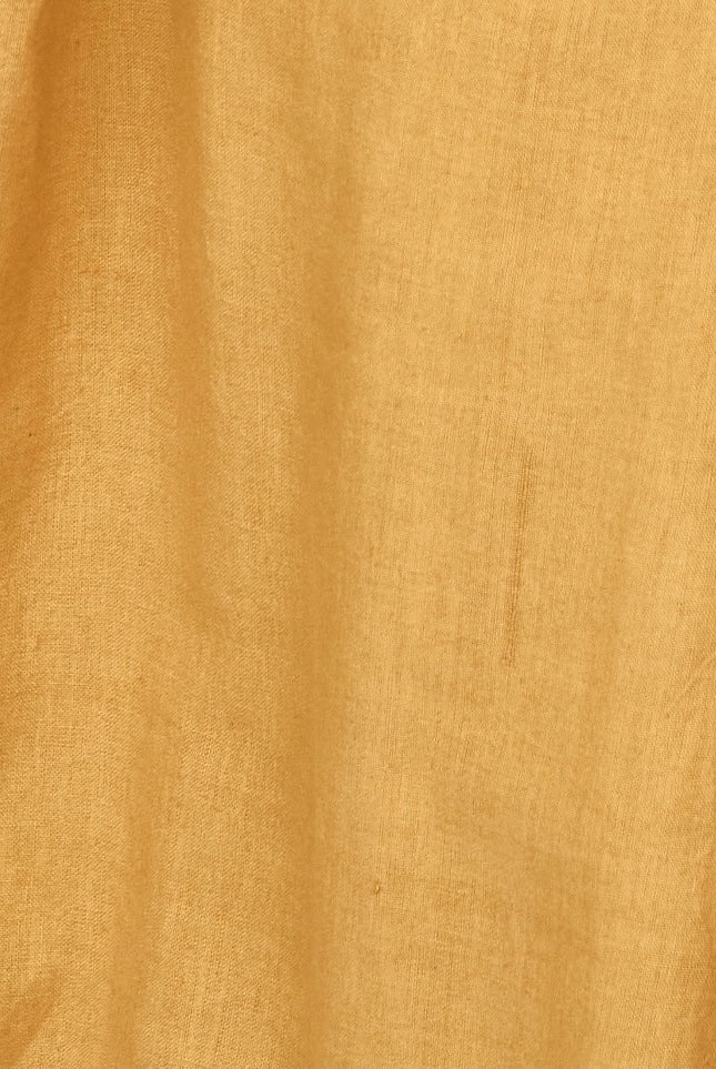 Girl wearing MIRTH women's smocked elastic savannah sleeveless cropped top set in yellow frost cotton