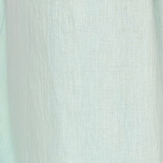 Girl wearing MIRTH women's smocked elastic sleeveless georgia midi dress in frost blue cotton