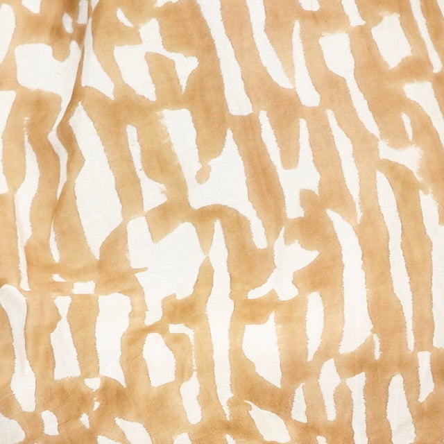 Girl wearing MIRTH women's ballon sleeve andaman cropped top in brown driftwood cotton silk