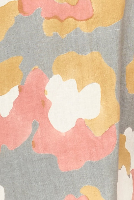 Girl wearing MIRTH women's long tiered short sleeve capri maxi dress in waterlily grey floral cotton