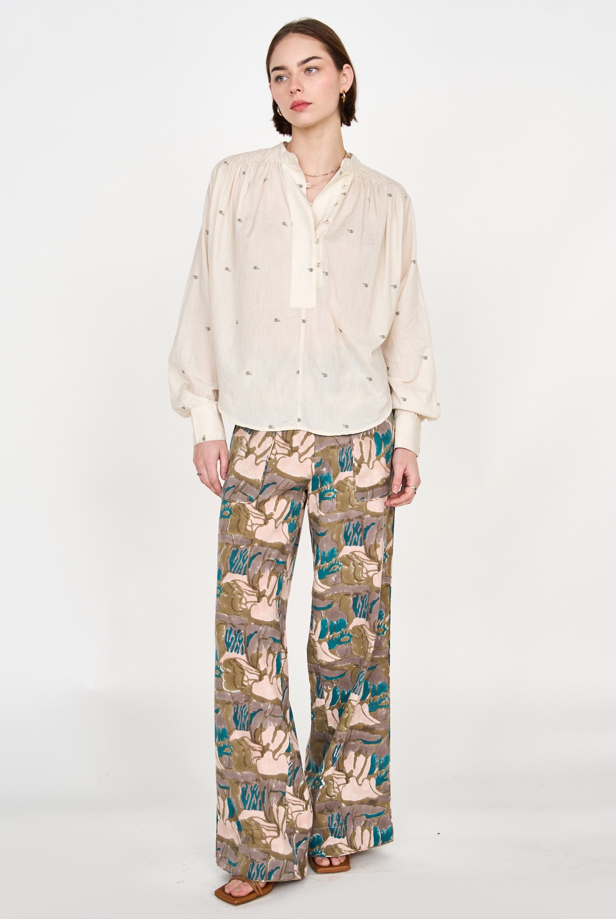 Girl wearing MIRTH women's high waist tivot pant in tannin brown cotton