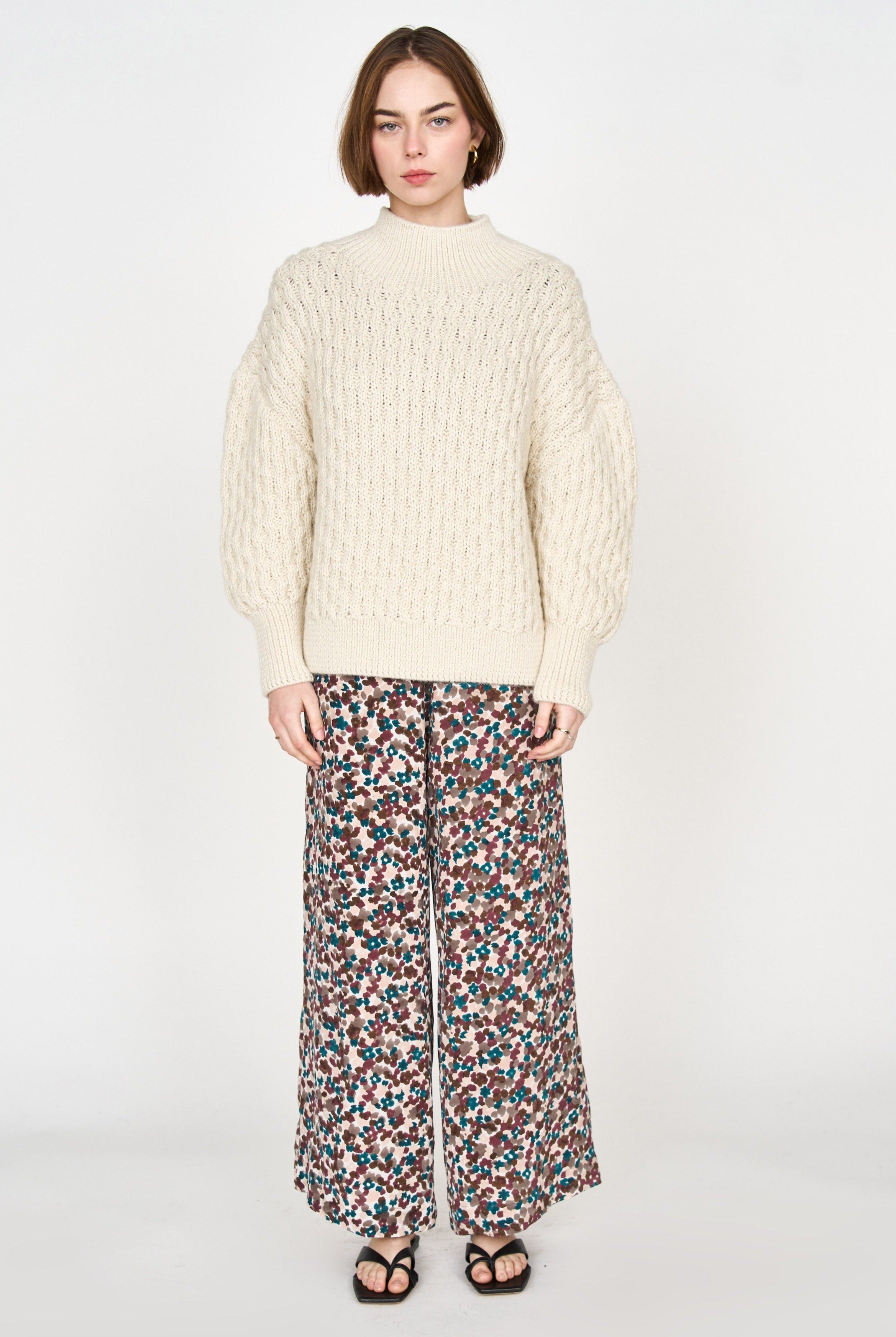 Girl wearing MIRTH women's long flowy riga trouser pant in purple brown amaryllis silk