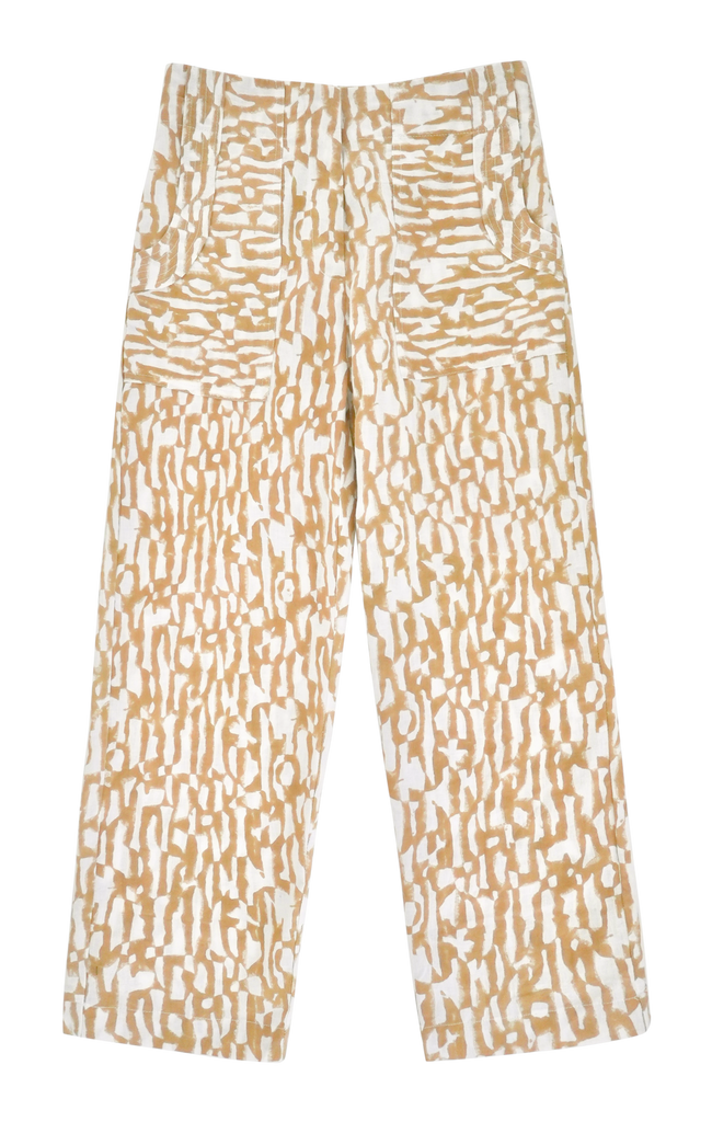 Girl wearing MIRTH women's high waist tailored resort tivot pant in driftwood brown print cotton