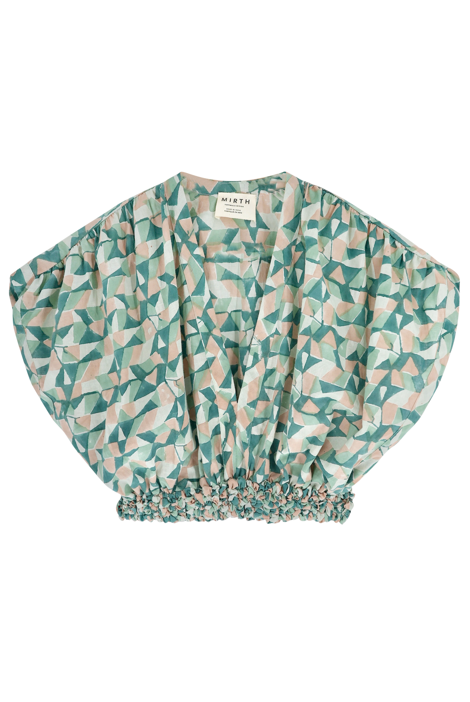 Girl wearing MIRTH women's smocked elastic waist cropped granada top set in seaglass green