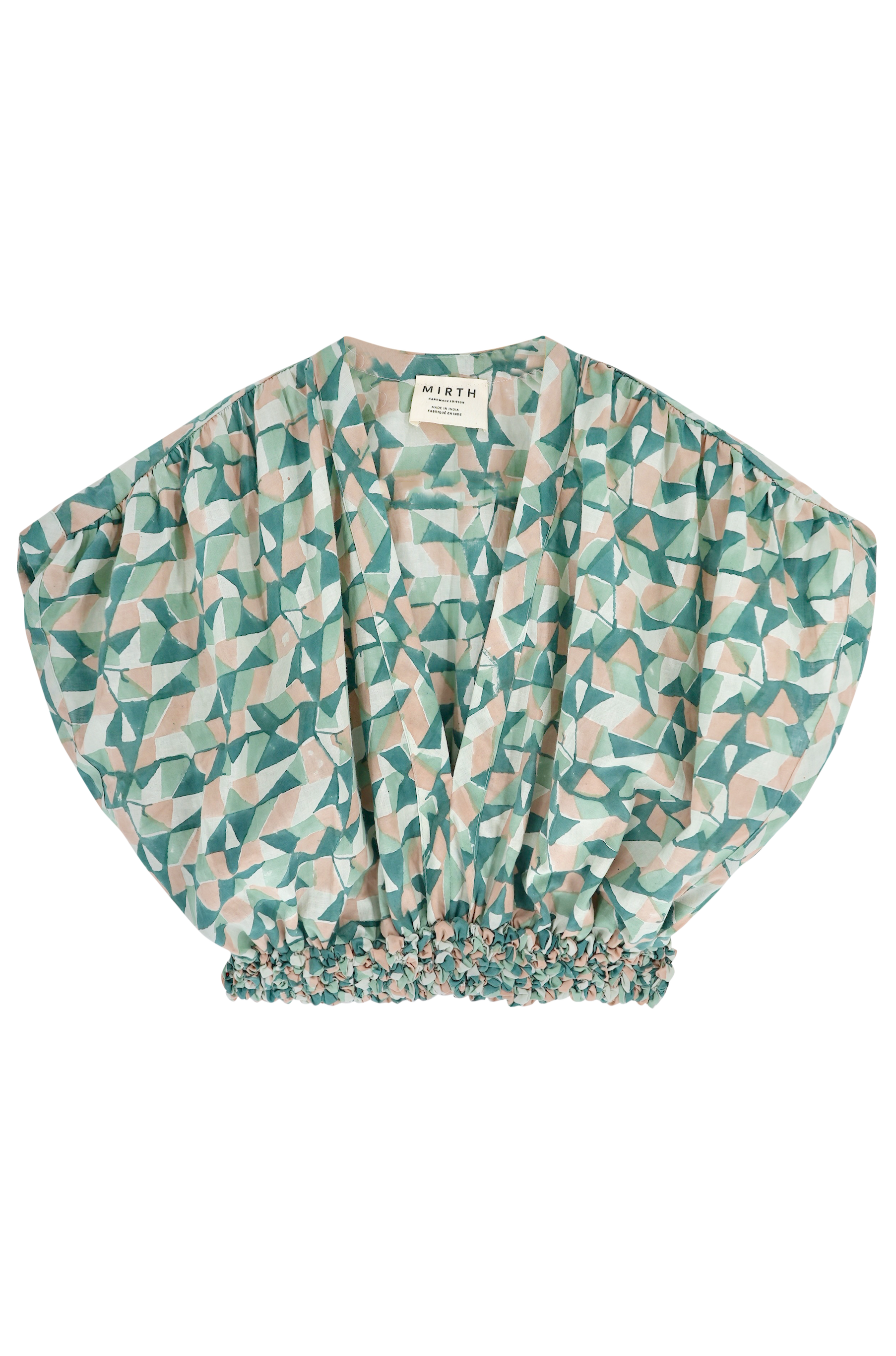 Girl wearing MIRTH women's smocked elastic waist cropped granada top set in seaglass green