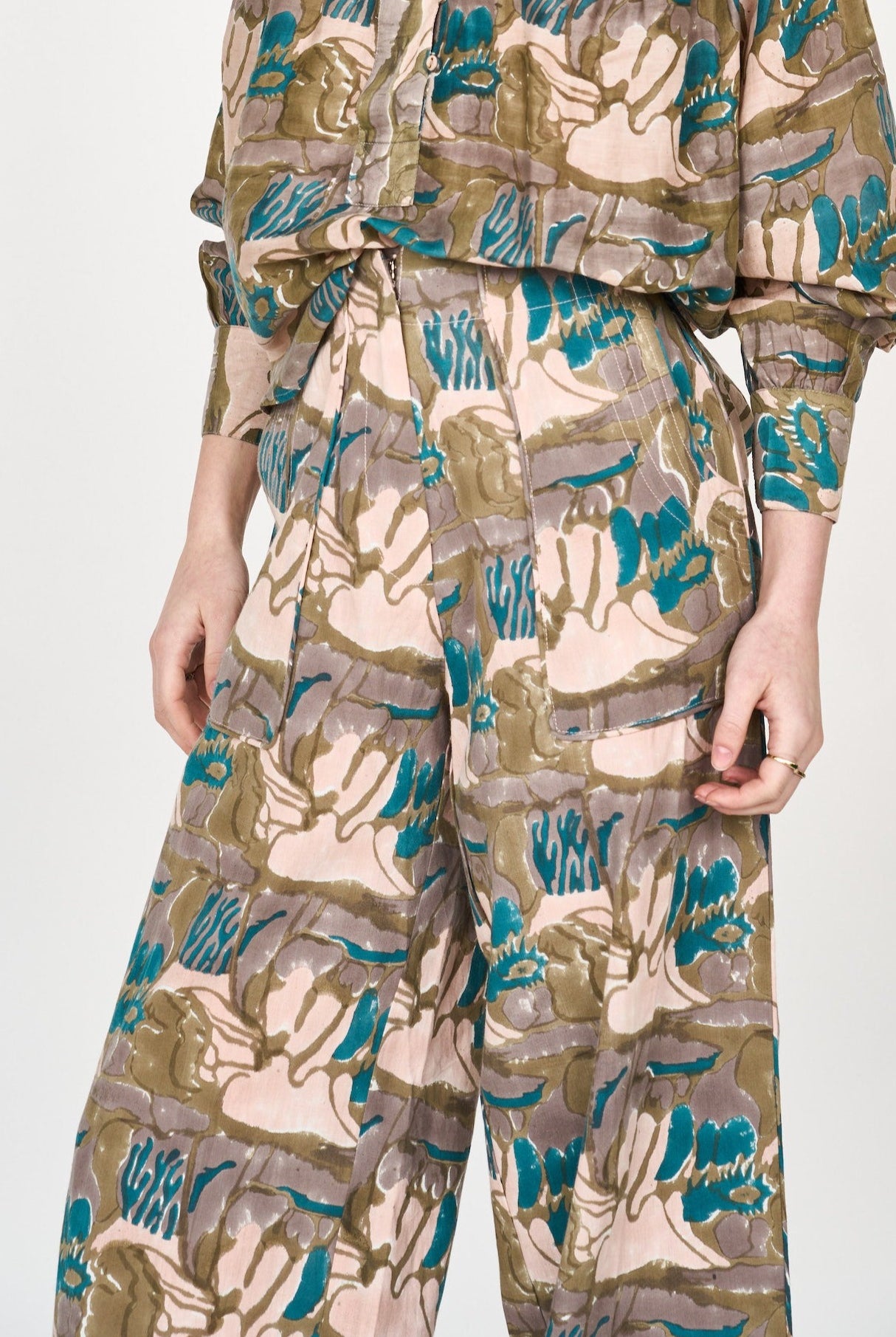 Girl wearing MIRTH women's high waist tivot pant in tannin brown cotton