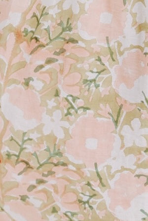 Girl wearing MIRTH women's long tiered short sleeve vienna maxi dress in snapdragon bloom pink floral print cotton