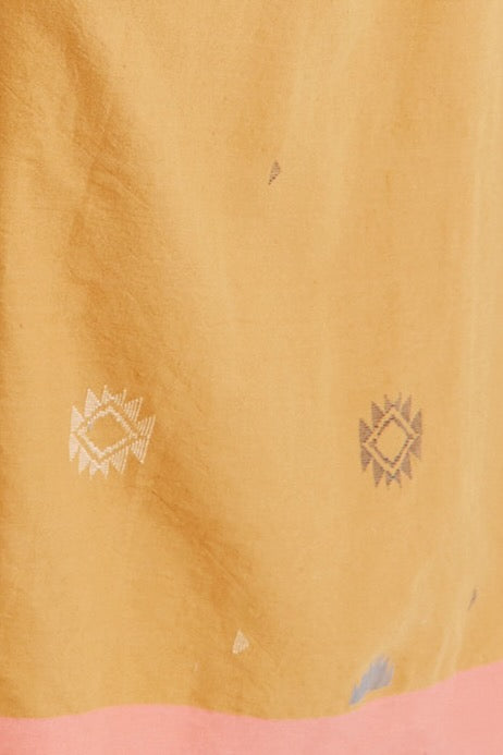 Girl wearing MIRTH women's long lucerne skirt set in handloomed sedona orange jamdani