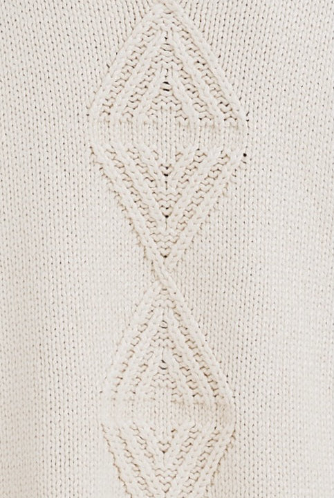 Girl wearing MIRTH women's knit short Osaka sweater dress in bone cream