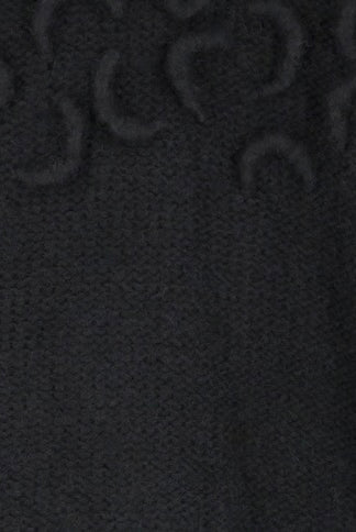 Girl wearing MIRTH women's knit cusco pullover sweater in black wool