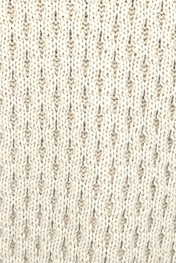 Girl wearing MIRTH women's pullover hand knit honeycomb weave megeve turtleneck sweater in ivory alpaca wool