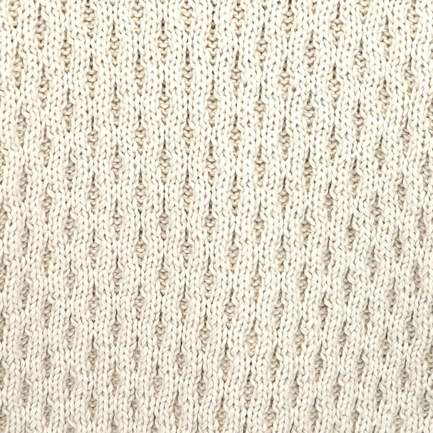 Girl wearing MIRTH women's pullover hand knit honeycomb weave megeve turtleneck sweater in ivory alpaca wool