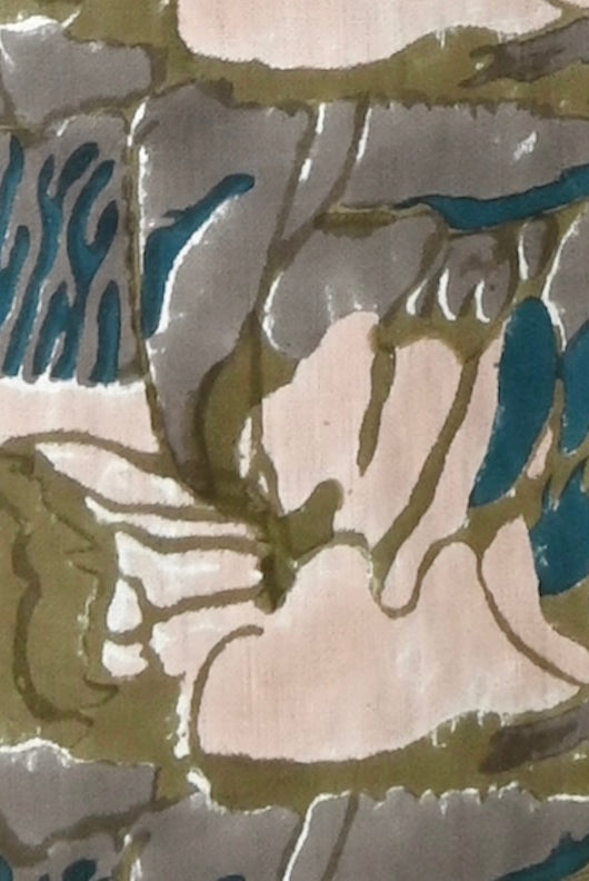 Girl wearing MIRTH women's square neck long caftan dress in brown moss reef blockprint