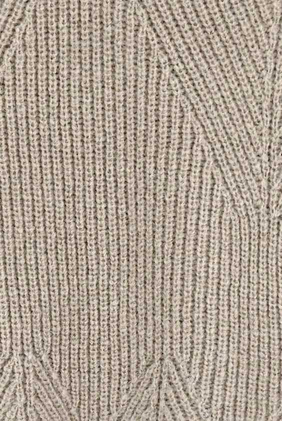 Girl wearing MIRTH women's knit v neck bellagio sweater in taupe brown wool