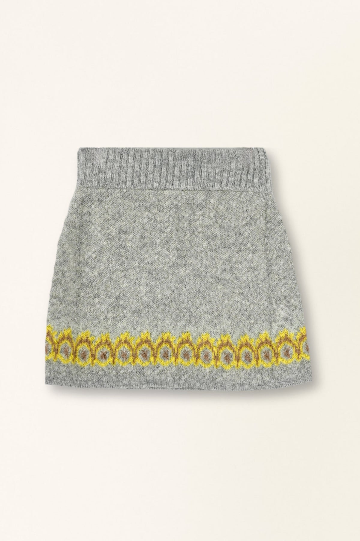 Gray knit skirt with yellow floral embroidery on a white background