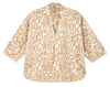 Girl wearing MIRTH women's v neck three quarter sleeve camden top in driftwood brown print cotton