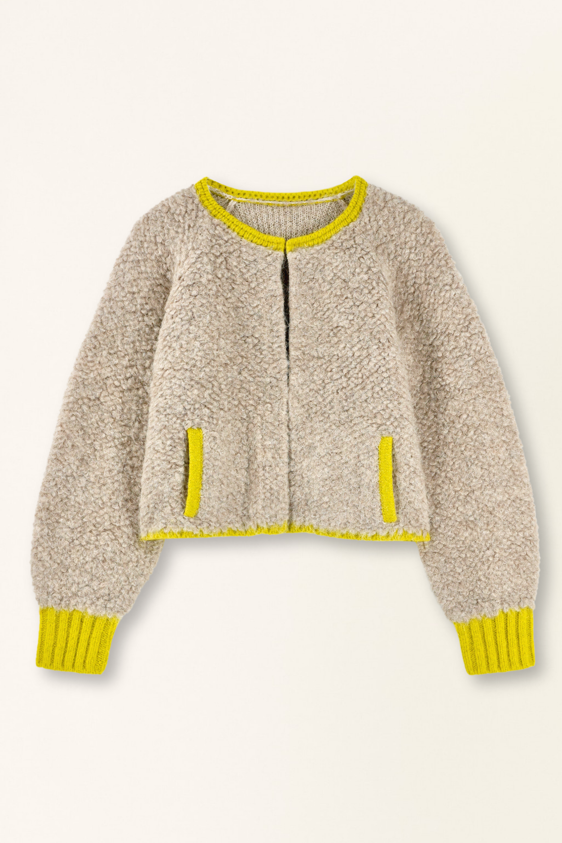 Beige fleece jacket with yellow accents on a beige background