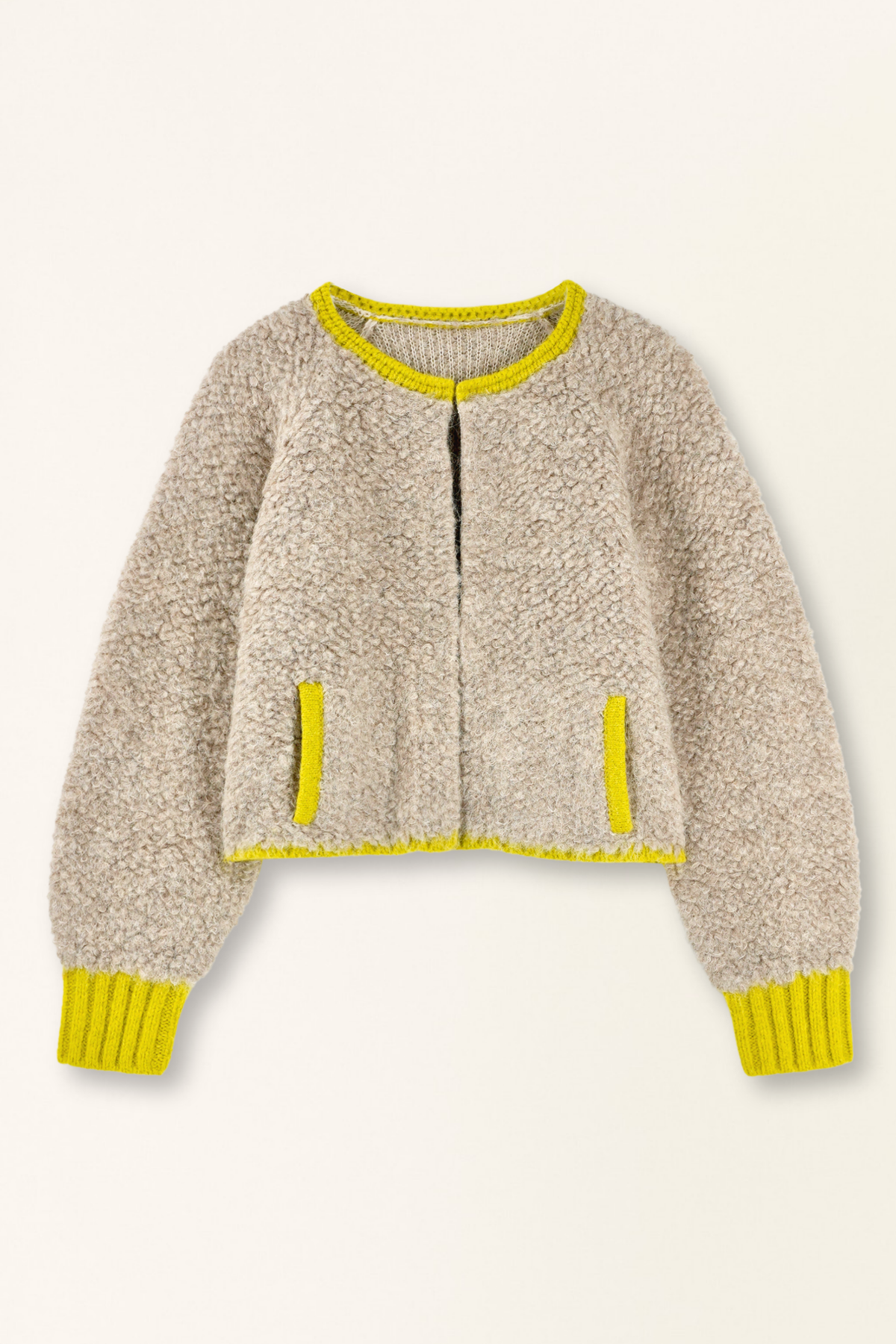 Beige fleece jacket with yellow accents on a beige background