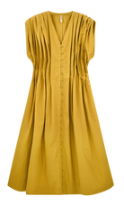 Girl wearing MIRTH women's midi v neck pleated korcula dress in gilded yellow cotton