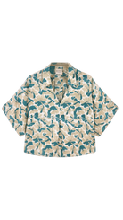 Girl wearing MIRTH women's v neck collared three quarter sleeve lanai top in plumeria blue floral print cotton