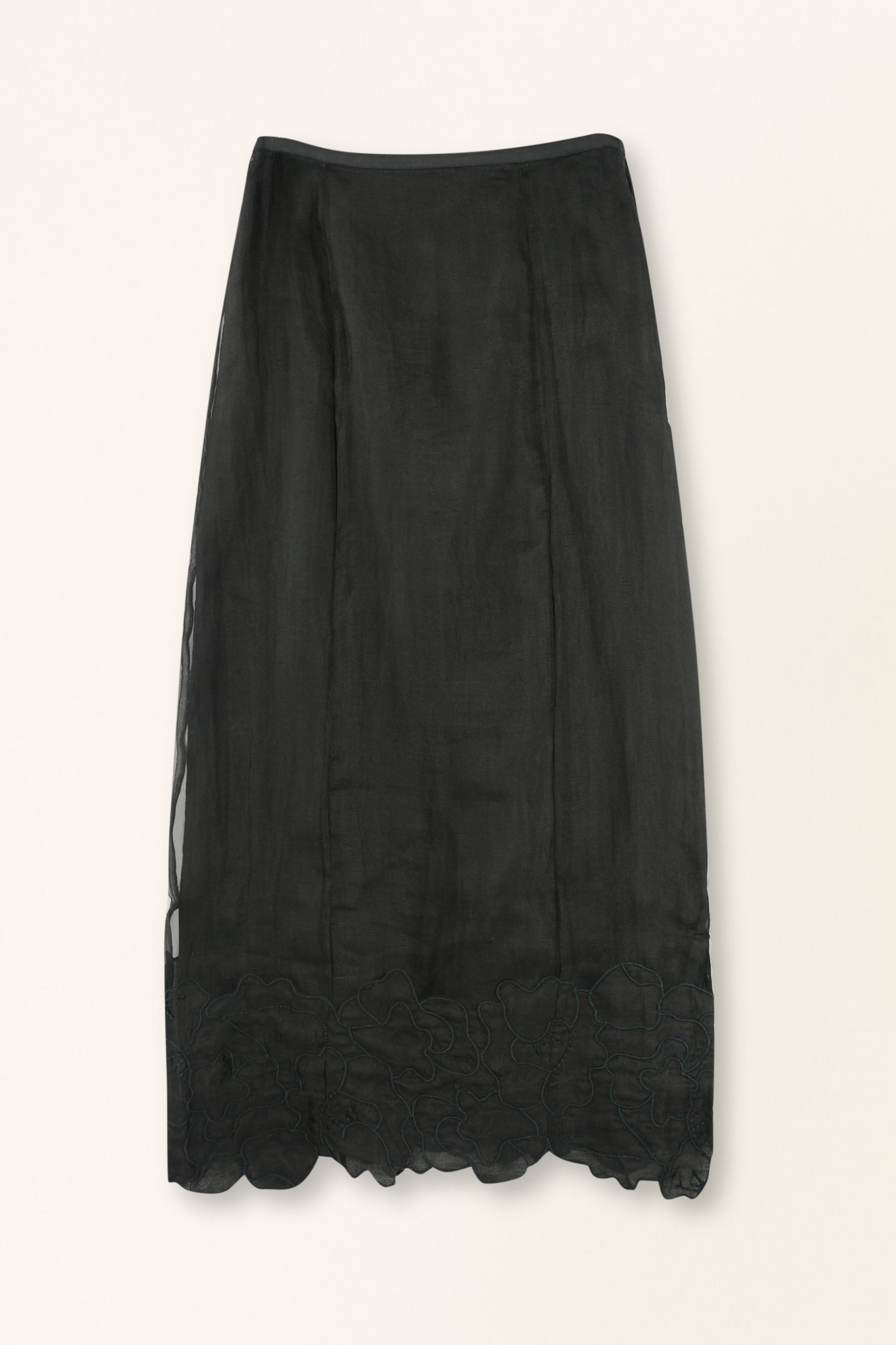 Black skirt with lace hem on a white background