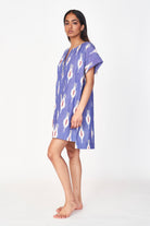 Girl wearing MIRTH women's short nightgown dress in nautical ikat blue cotton