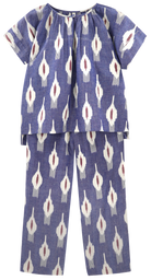 Girl wearing MIRTH women's short sleeve pajama pant set in nautical ikat blue cotton