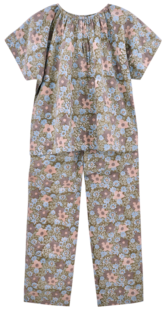 Girl wearing MIRTH women's short sleeve pajama pant set in stargazer grey cotton