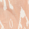 Girl wearing MIRTH women's v neck three quarter sleeve camden top in peach conch ikat handloomed cotton