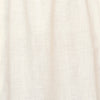 Girl wearing MIRTH women's v neck layered pintuck sleeveless long belted laguna dress in parchment cream cotton