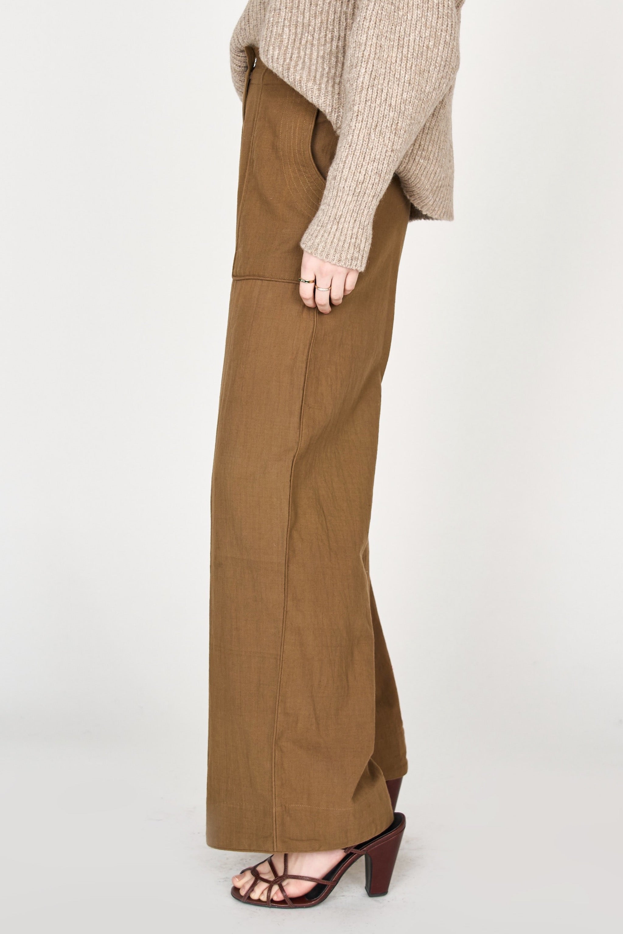 Girl wearing MIRTH women's high waist tivot pant in tannin brown cotton