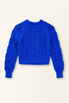 Blue sweater with a pattern on a white background