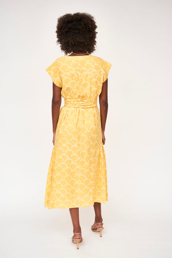 Girl wearing MIRTH women's short sleeved oaxaca long dress in sunnyside yellow cotton