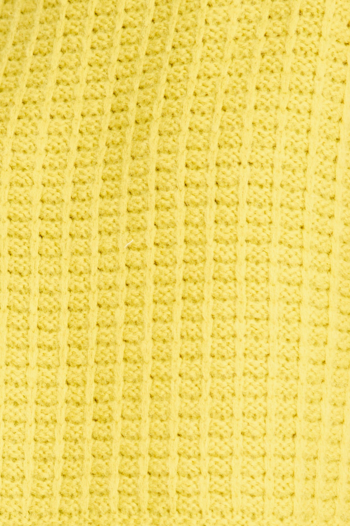 Close-up of a textured yellow fabric