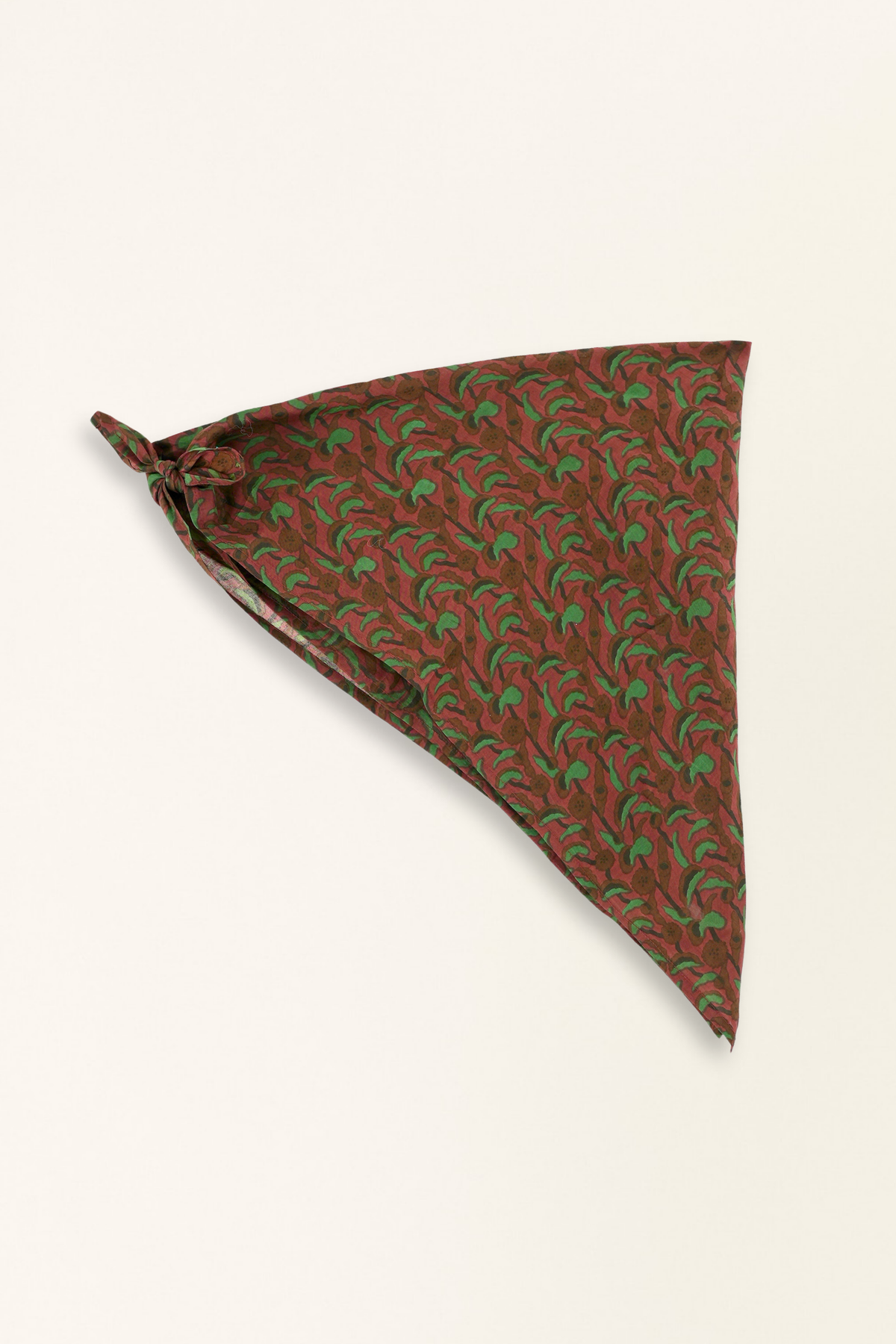 Triangular fabric pocket square with green leaf pattern on a white background