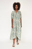 Girl wearing MIRTH women's long buttoned balloon sleeve somerset dress in plumeria blue floral print cotton