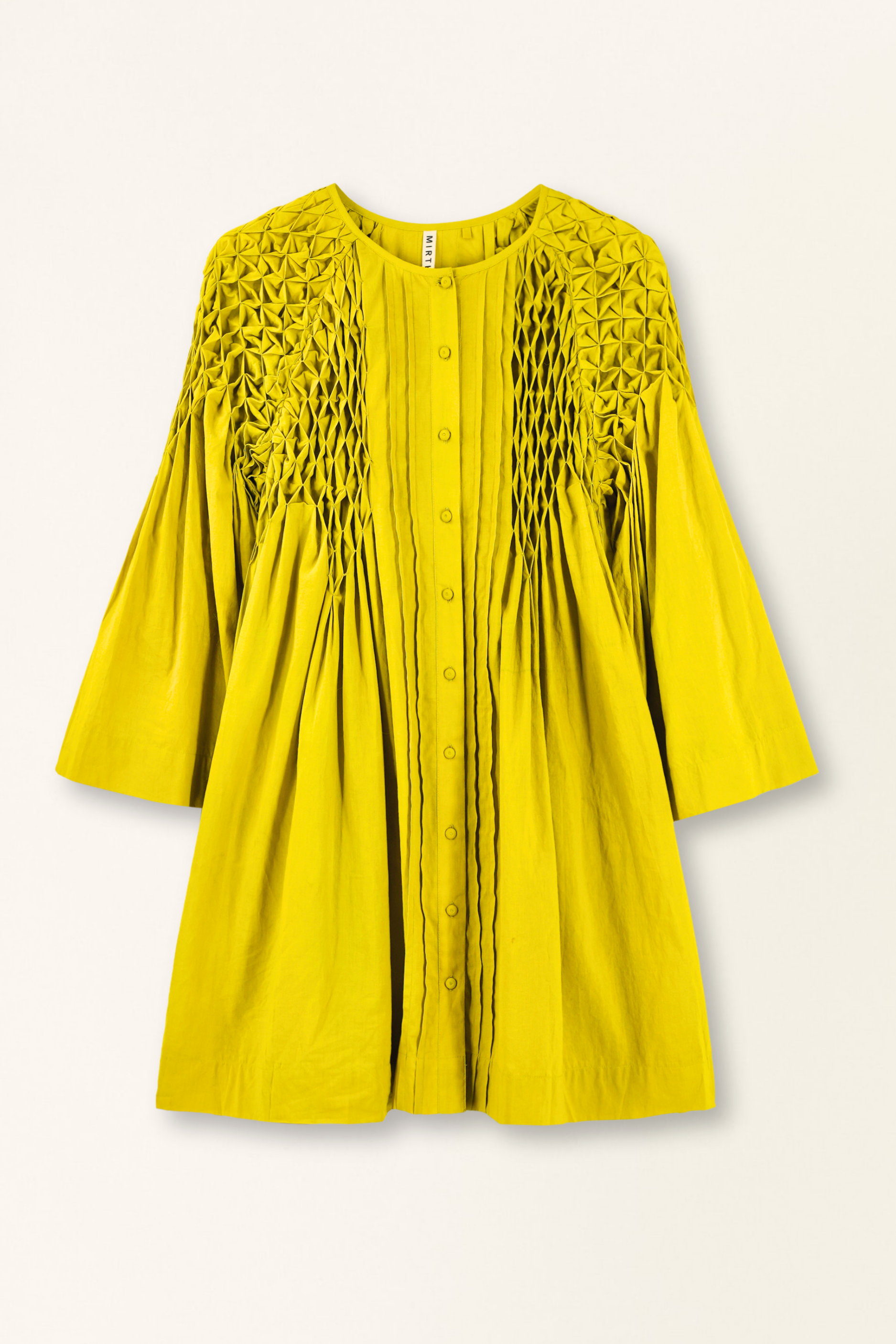 Yellow dress with lace detailing on a white background