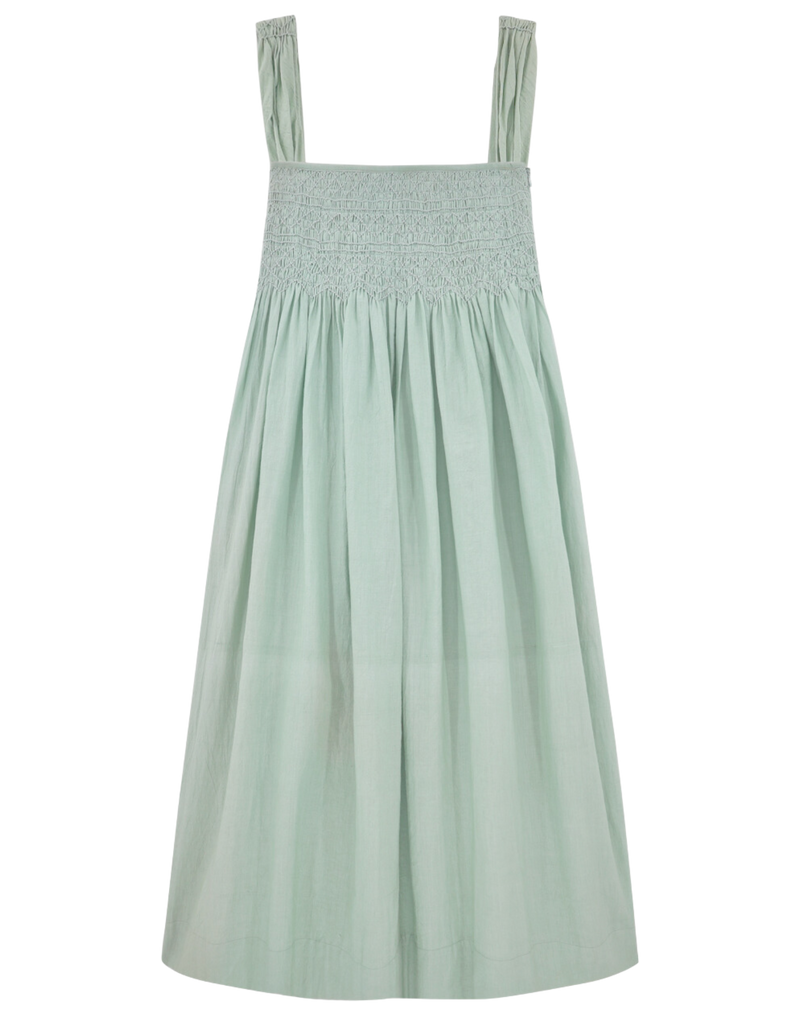 Girl wearing MIRTH women's smocked elastic sleeveless georgia midi dress in frost blue cotton