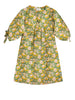Girl wearing MIRTH women's balloon sleeve short belem vacation dress coverup in camelia bloom green floral print cotton