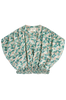 Girl wearing MIRTH women's smocked elastic waist cropped granada top set in seaglass green
