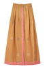 Girl wearing MIRTH women's long lucerne skirt set in handloomed sedona orange jamdani