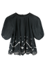 Girl wearing MIRTH women's balloon sleeve somerset short sleeve blouse in black carnival jamdani cotton