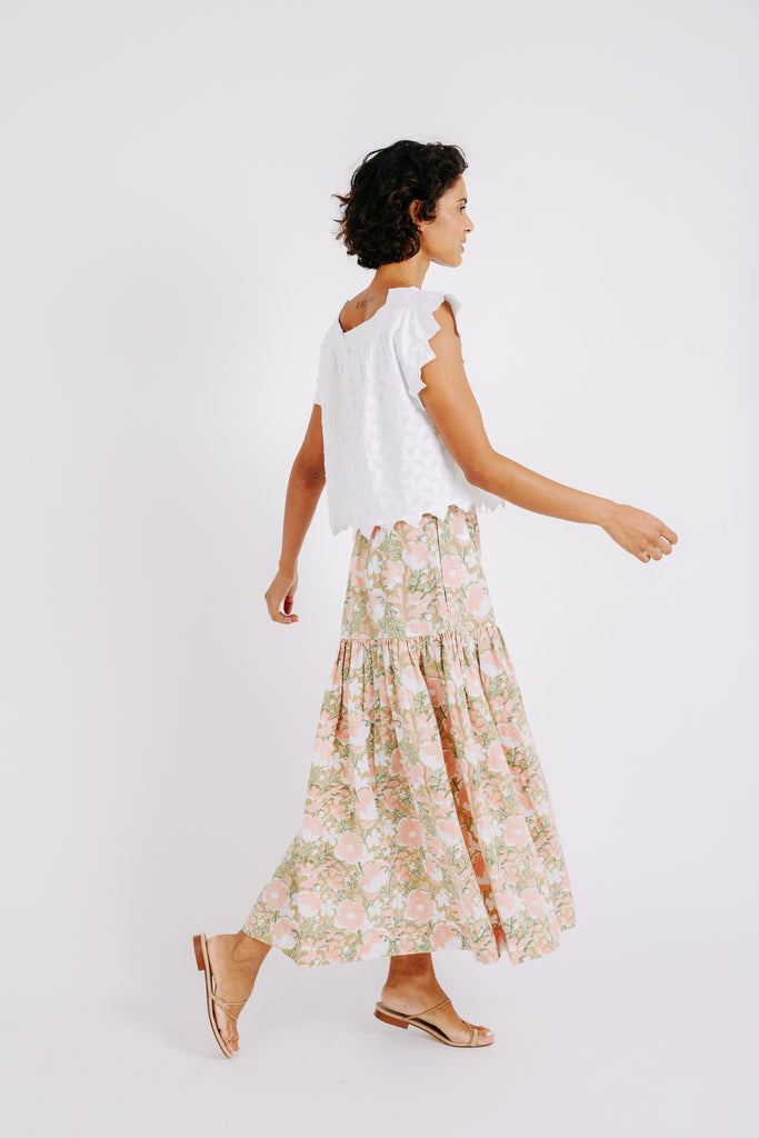 Girl wearing MIRTH women's long tiered bay skirt in snapdragon bloom pink floral print cotton
