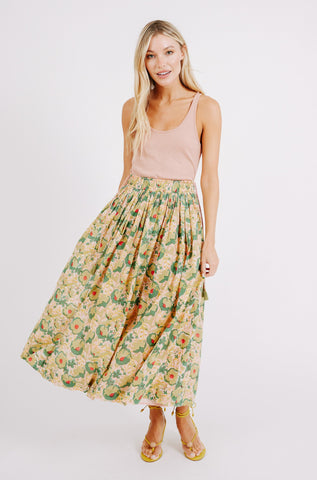Girl wearing MIRTH women's flowy maxi verona cotton vacation skirt set in rose bloom pink floral print